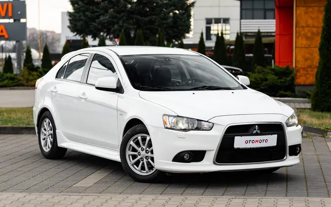 samochody osobowe Mitsubishi Lancer cena 32900 przebieg: 150000, rok produkcji 2014 z Radom